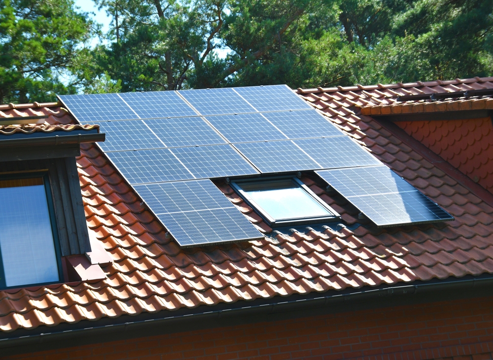 Residential solar panels professionally installed on a clay tile roof, providing clean, renewable energy through expert solar installation in San Diego